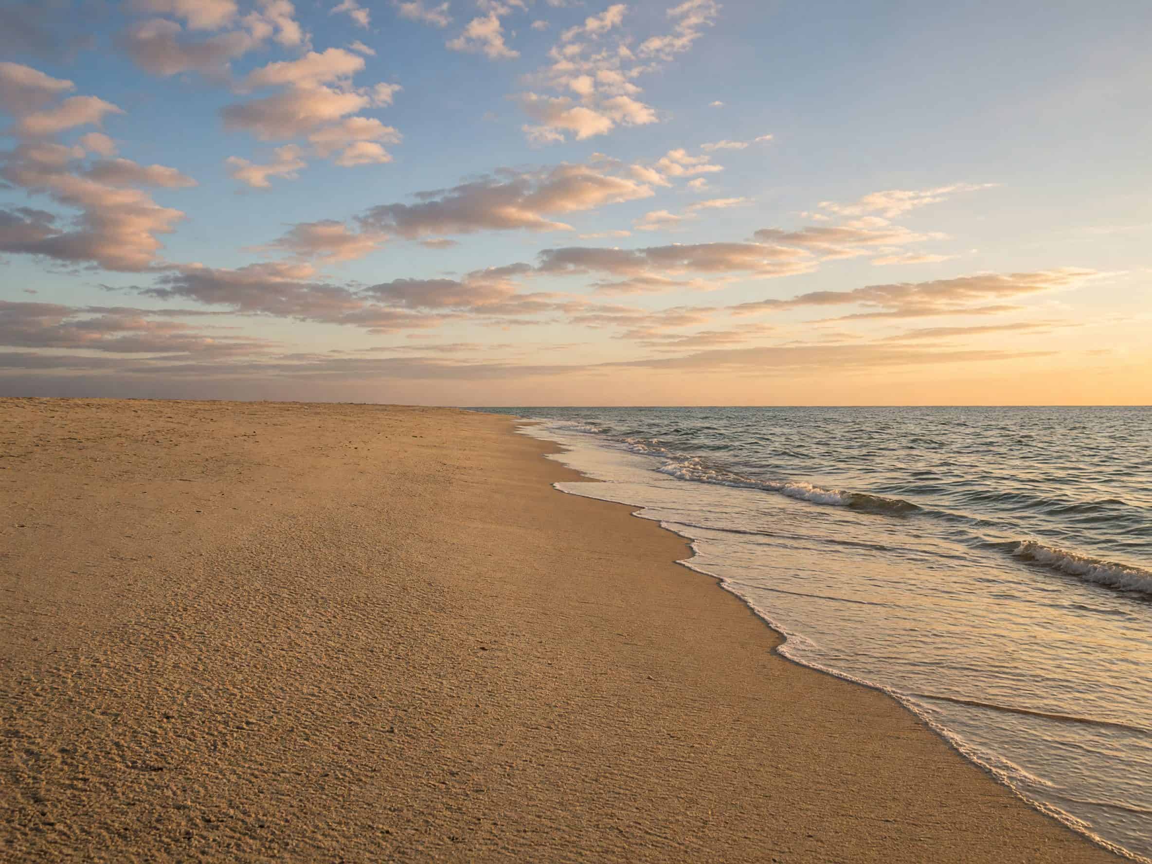 Empty Miami Beach shoreline at golden hour